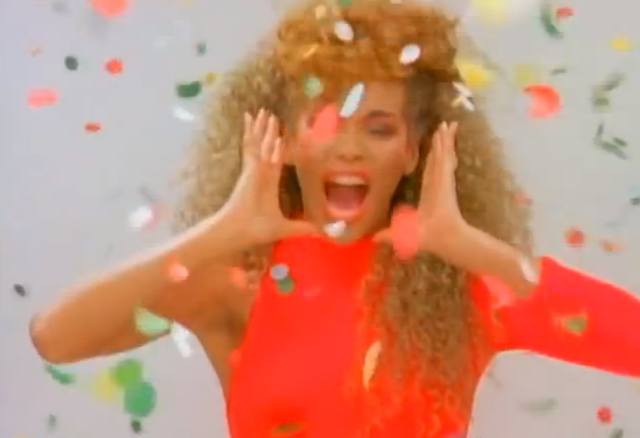 Graffiti art with &quot;Get Down&quot; text in Whitney Houston's &quot;I Wanna Dance With Somebody&quot; video