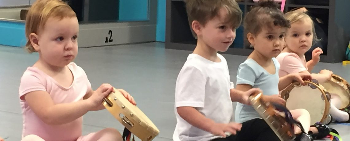 Students demonstrating synergy dance techniques at Austin's premier dance studio.