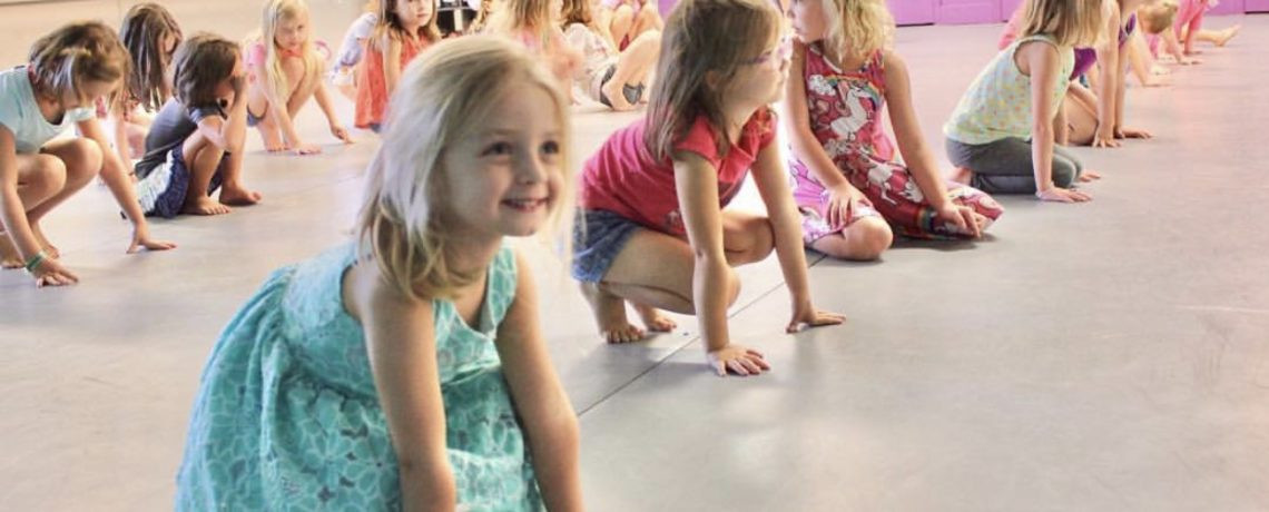 A happy group of synergy dance students at Synergy Dance Studio, Austin, Texas.