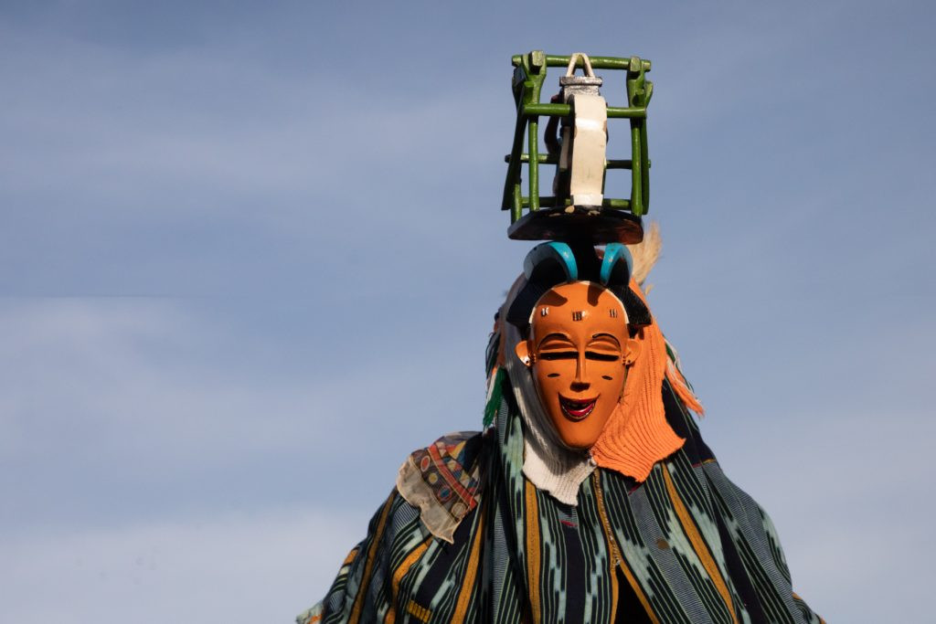 Intricate Zaouli Mask of Sortanvani in Ivory Coast: A close-up view of the Sortanvani mask, representing weavers in Guro culture, part of the Zaouli dance tradition.