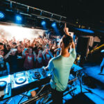 Energetic crowd enjoying a vibrant night at one of the top dance clubs in Sarasota, Florida.