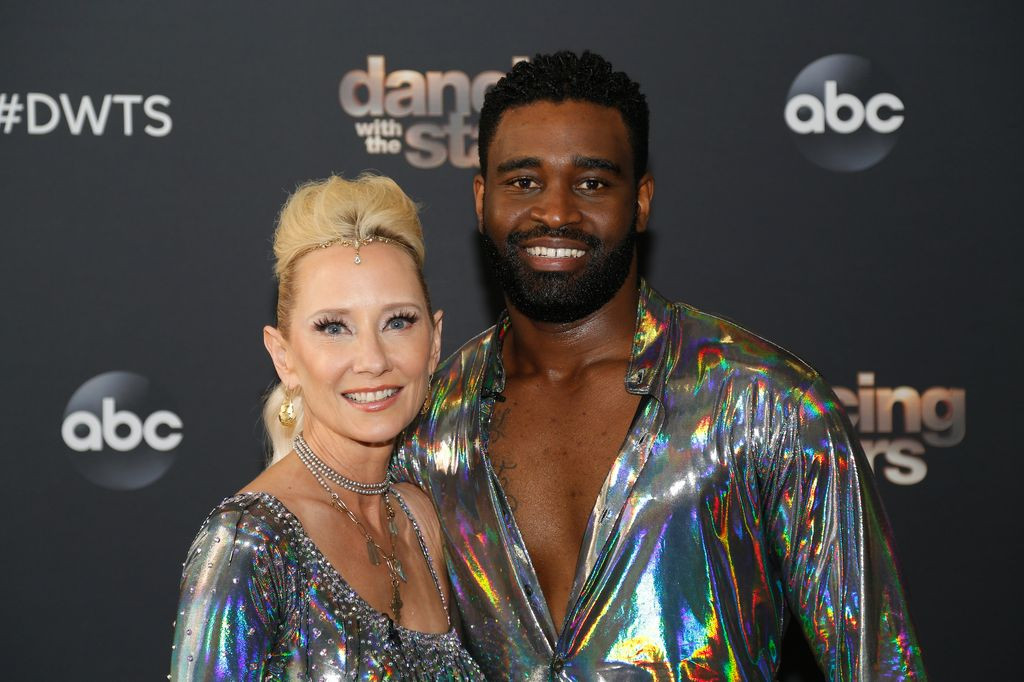 Anne Heche and Keo Motsepe posing on Dancing with the Stars