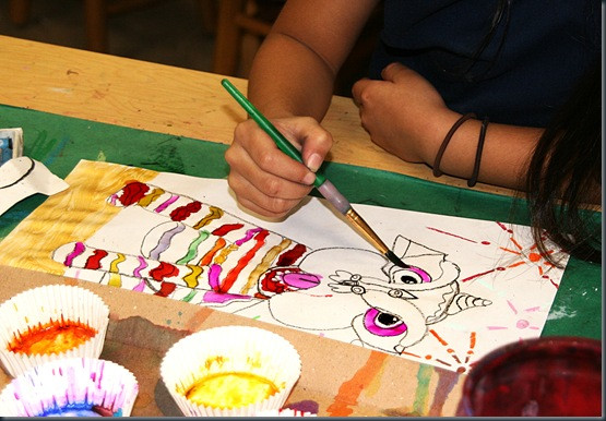 Collection of diverse student lion dance art projects, showcasing different interpretations and color palettes.
