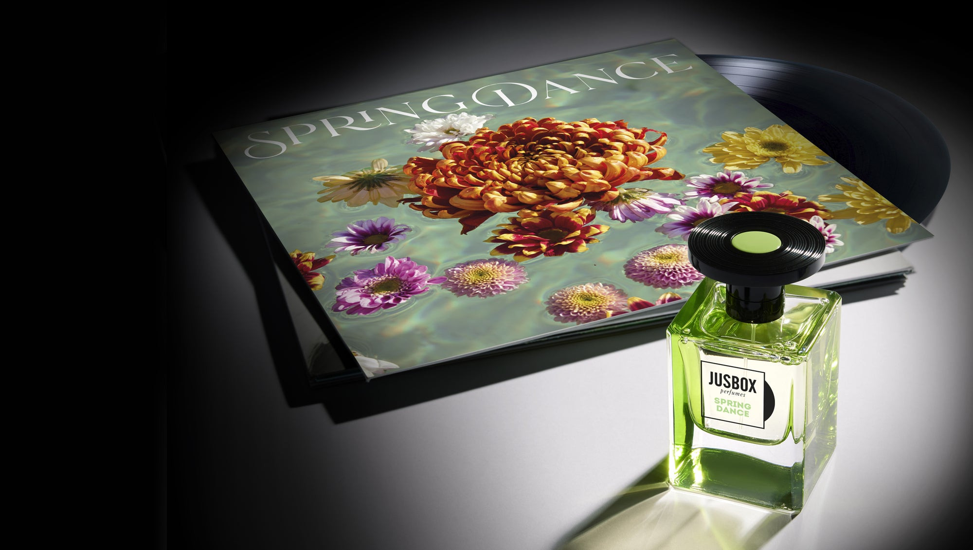 Jusbox Spring Dance perfume banner, promotional image.