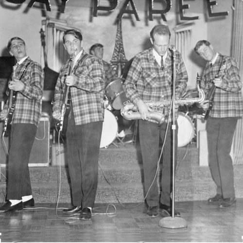 The Beach Boys in 1962 performing live, capturing the youthful energy of surf rock