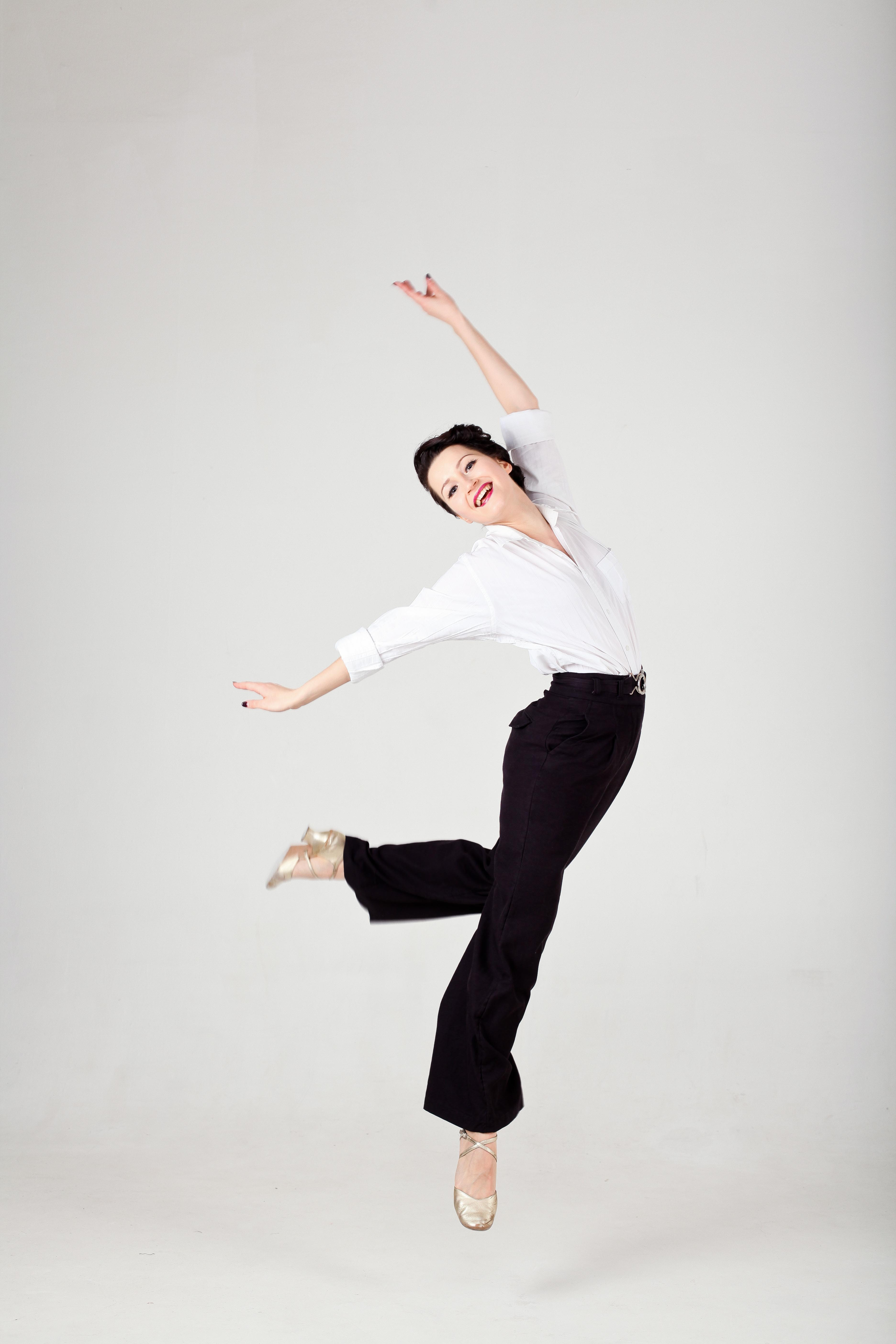 Professional dancer wearing custom dance shoes during performance