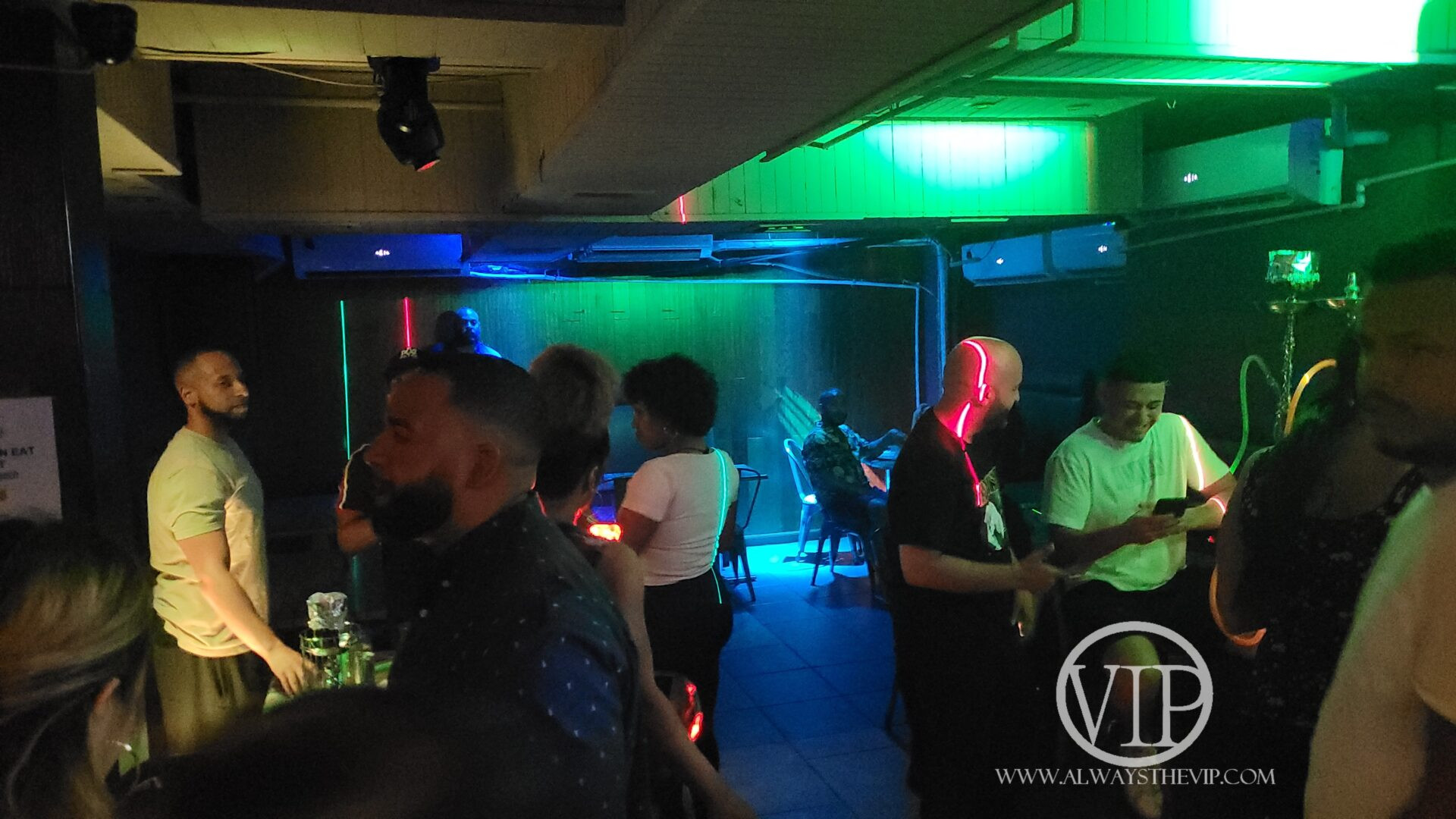 Cafe Nunez NYC showing a view of the dance floor and guests seated at tables, capturing the restaurant's transition into a Latin party spot. Photo By C Nez Byrd.