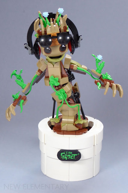 The completed Lego Marvel 76297 Dancing Groot figure, accessorized with headphones and sunglasses, in a dynamic pose.
