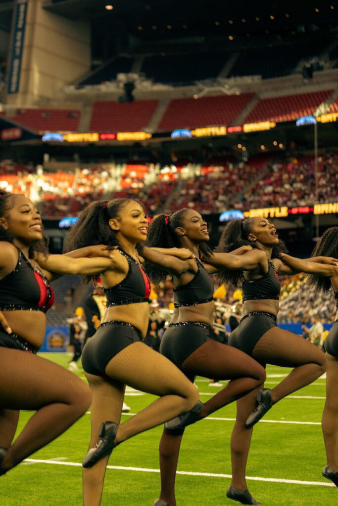 Majorette dancers from Grambling State University's Orchesis Dance Company perform a high-energy halftime routine.