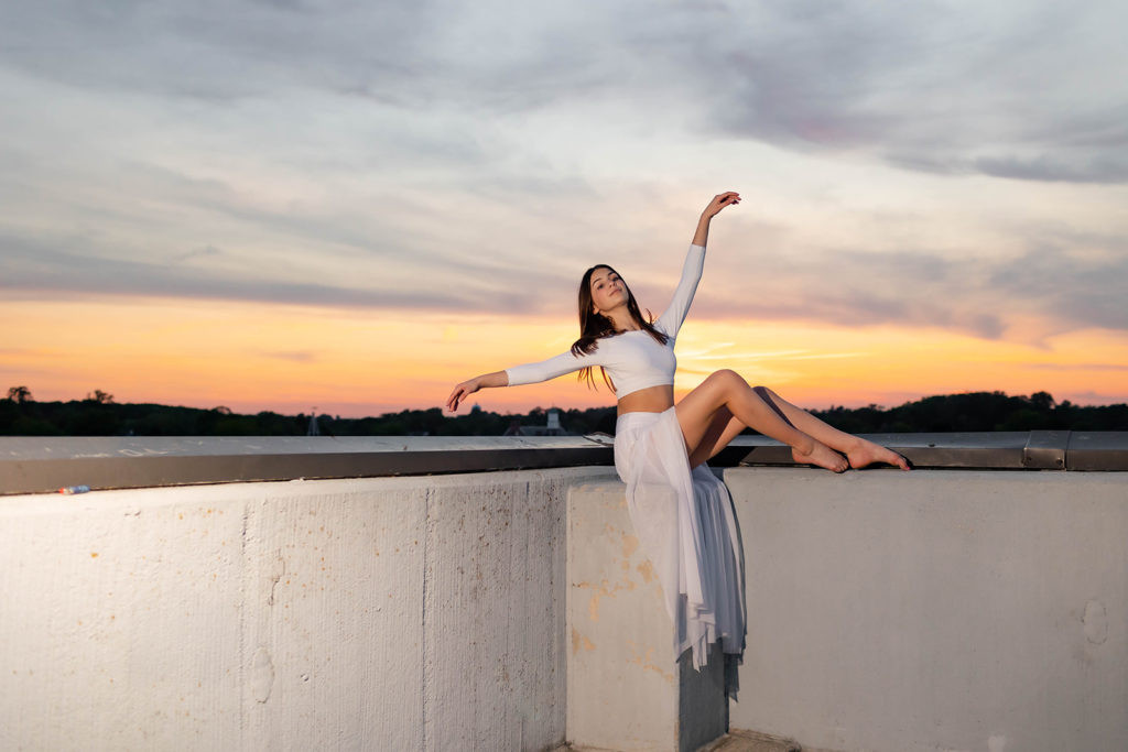 Artistic dance photography emphasizing lines and shapes of the dancer's body.