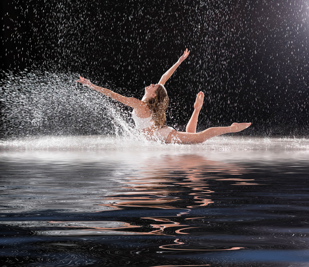 Elegant ballet dancer in a flowing costume, a classic dance photography image.
