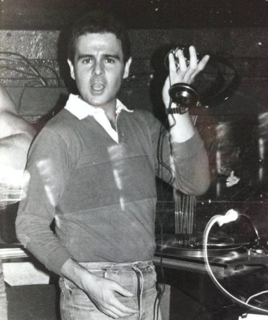 Ian Levine DJing at Heaven in 1979, showcasing the early days of London's iconic gay dance club and the burgeoning Hi-NRG scene.