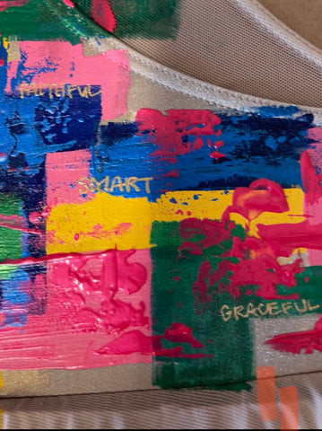 Personalized dance costume with hidden words of prayer painted inside for a meaningful touch.