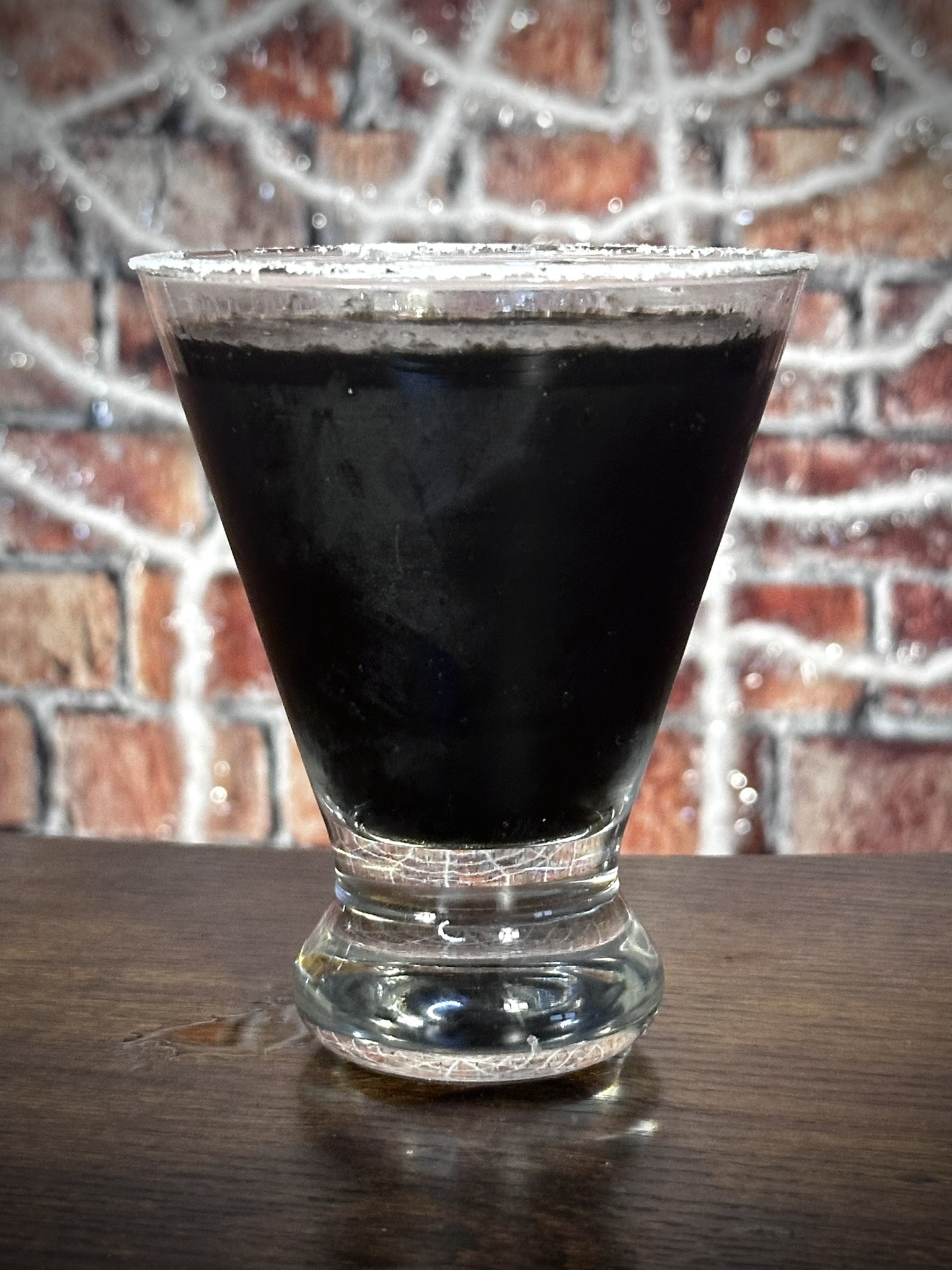 The Lethal Protector cocktail, a Venom-themed drink recipe with tequila and balsamic vinegar