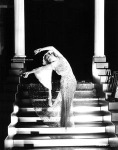 Joan Crawford smiling elegantly