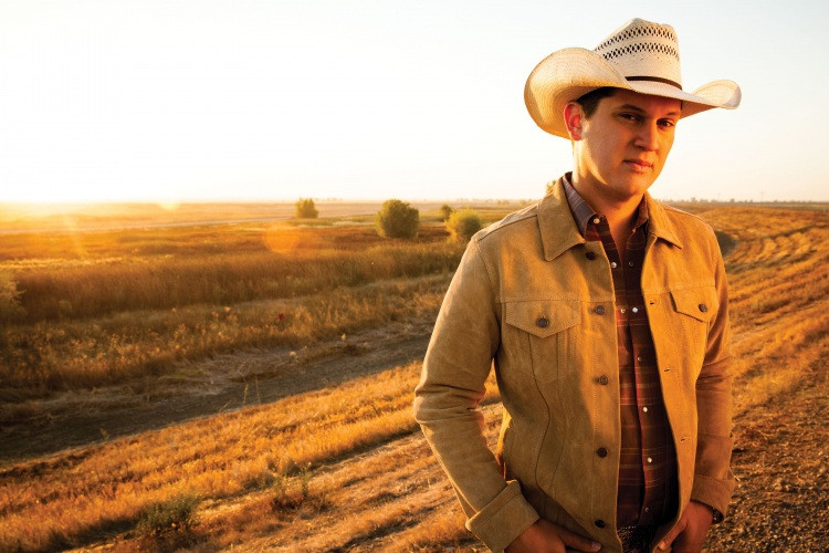 Jon Pardi performing live, showcasing his authentic country charm and vocal talent