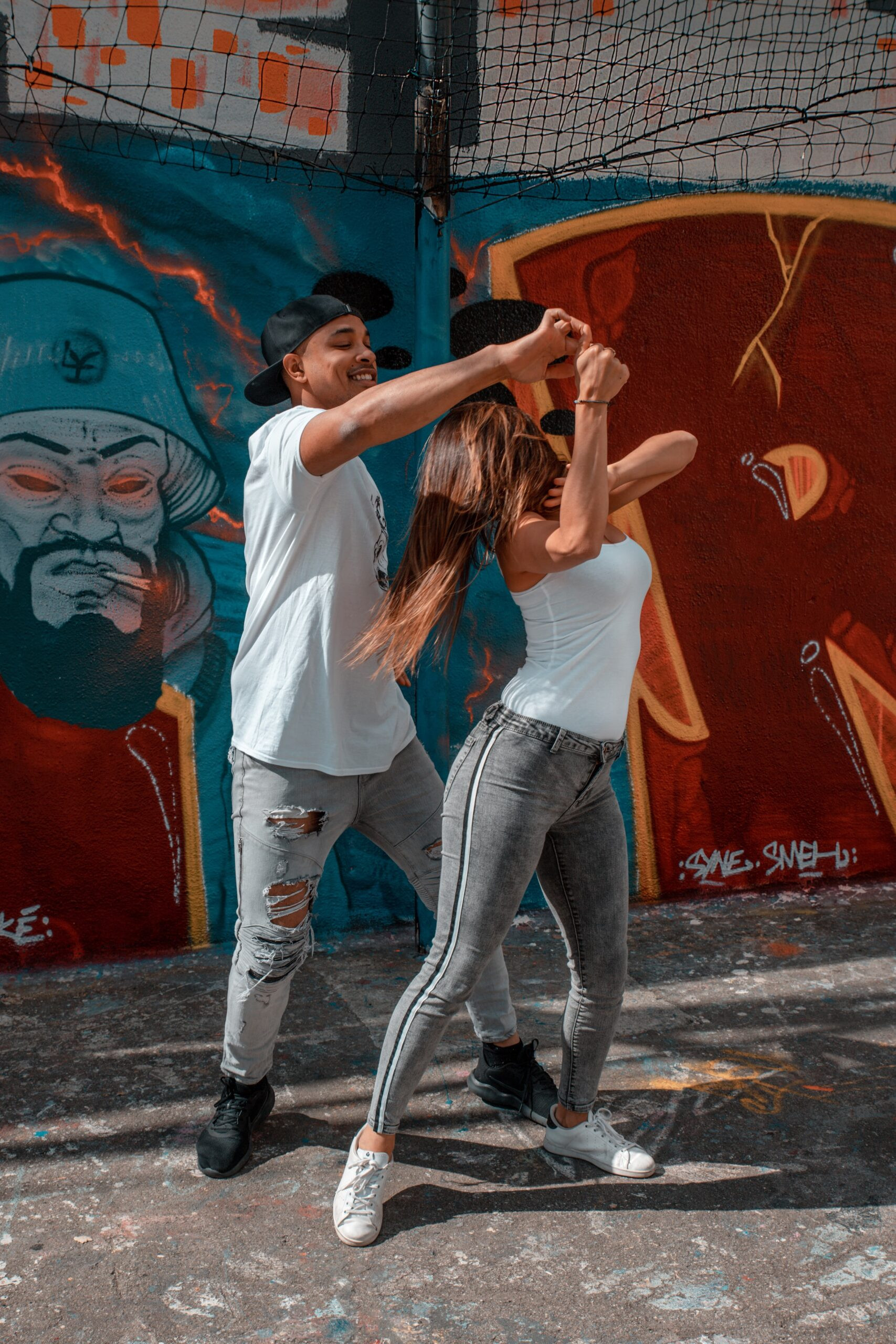 Experience the fluidity and connection of Brazilian Zouk dance as a couple performs a graceful move.