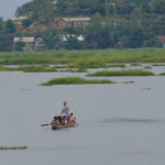 Panoramic view of Loktak Lake in Manipur, India, showcasing its hillock surroundings.