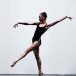 Chyrstyn Mariah Fentroy, a black ballet dancer, performing William Forsythe’s Pas/Parts on pointe, showcasing strength and artistry.