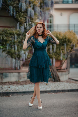 Flapper in a 1920s dress dancing the Charleston