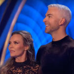 Dancing on Ice partners Charlie Brooks and Ed Radford smiling on the ice rink before Radford's injury forced a cast change.