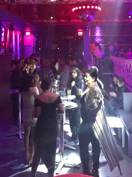 Opus Lounge NYC showcasing the venue and a crowd on the dance floor, highlighting its vibrant atmosphere in Upper Manhattan. Photo By Edmary S (Yelper).