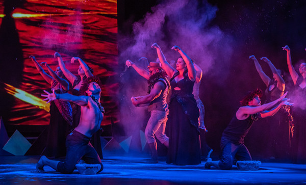 Patrick Makuakakane 5 Photo showcasing dancers in motion, exemplifying contemporary Hawaiian dance movements