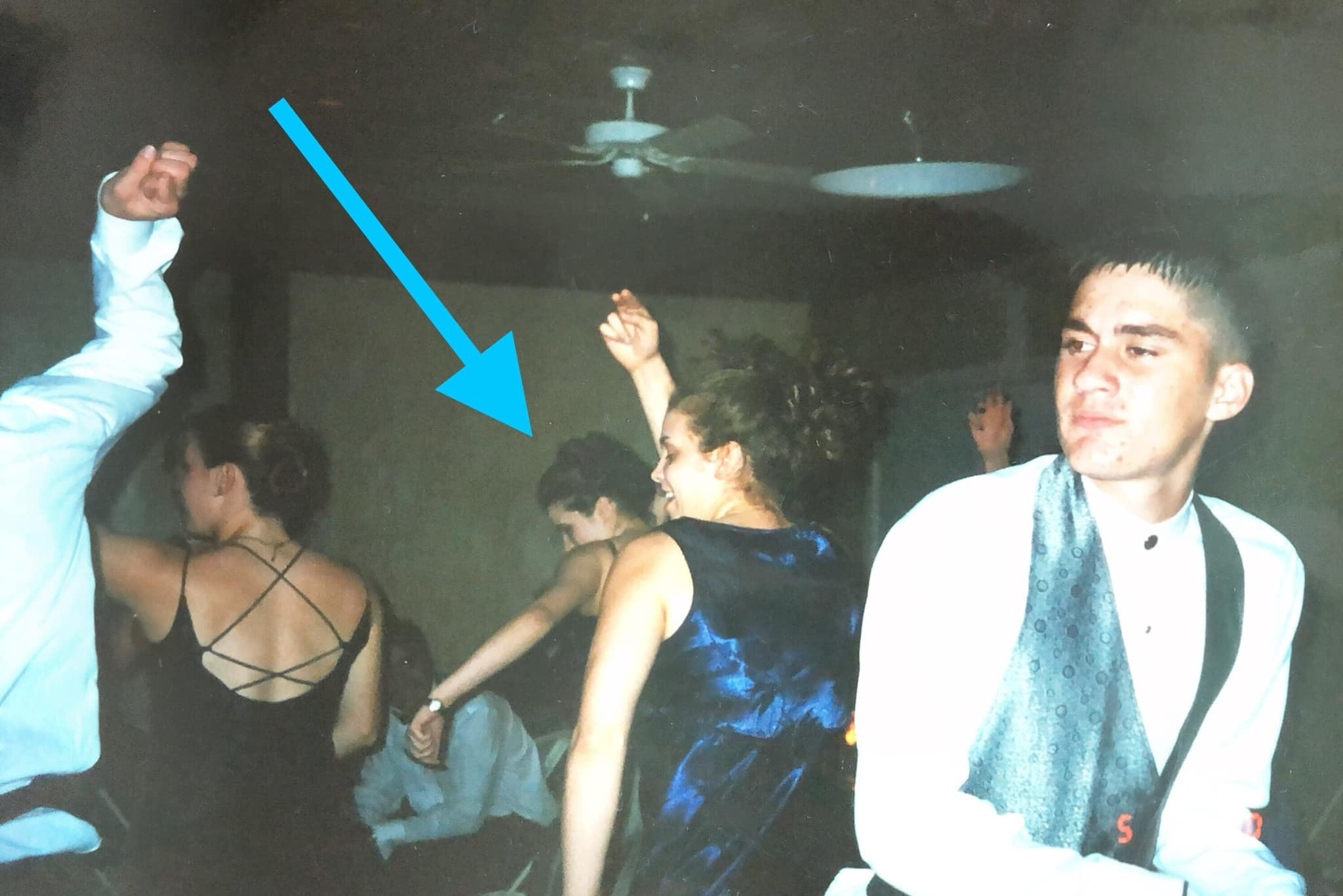Throwback photo of the author performing the Bye Bye Bye dance at her senior prom in 2000, showcasing her passion for *NSYNC and the dance.