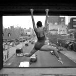 A ballet dancer gracefully posing en pointe, showcasing the artistry of ballet dancers dancing.