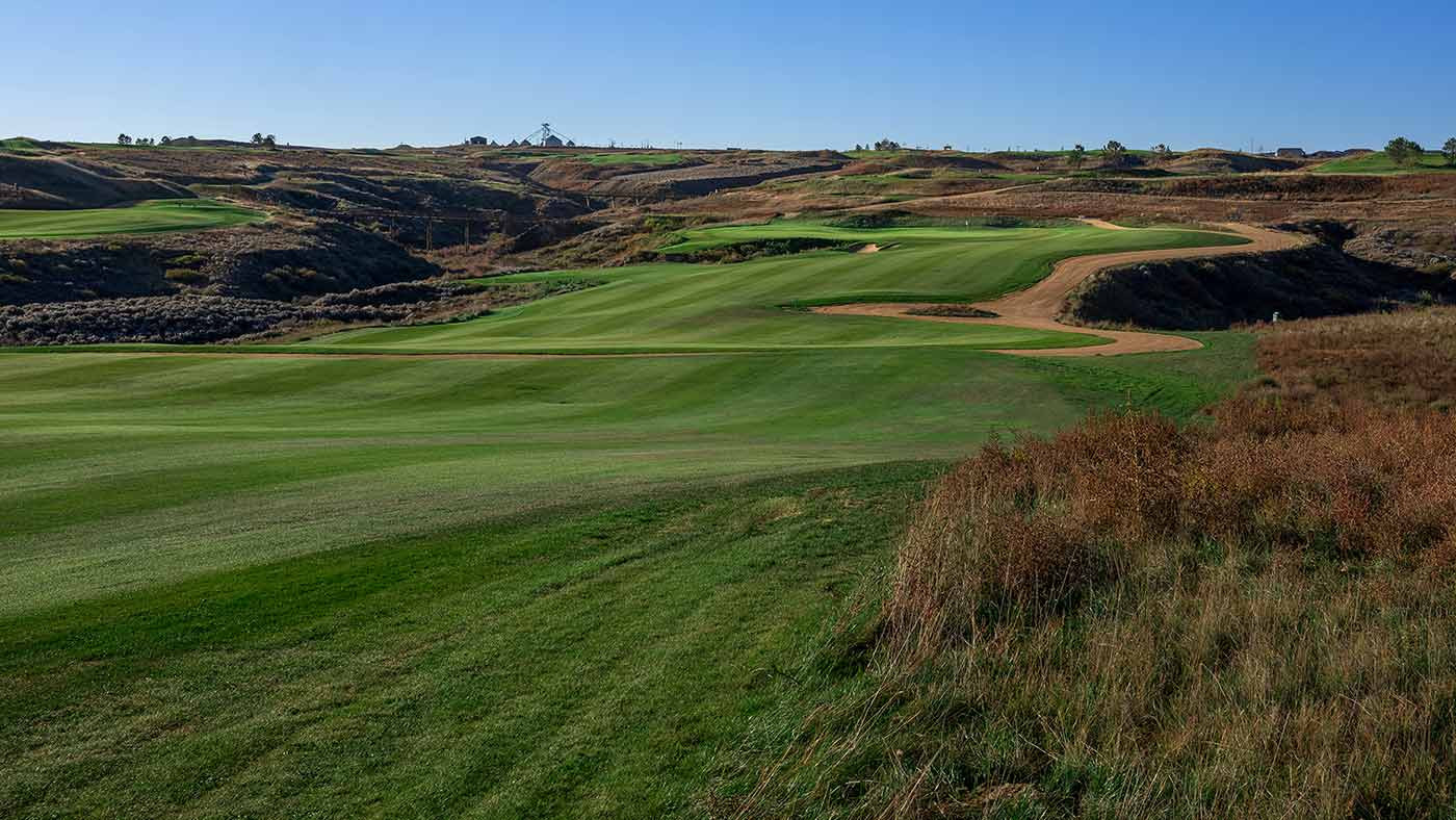 An expansive fairway at RainDance National, highlighting the generous width and strategic bunkering of the course.