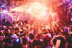 Crowd dancing at Schimanski nightclub in Williamsburg, Brooklyn, NYC