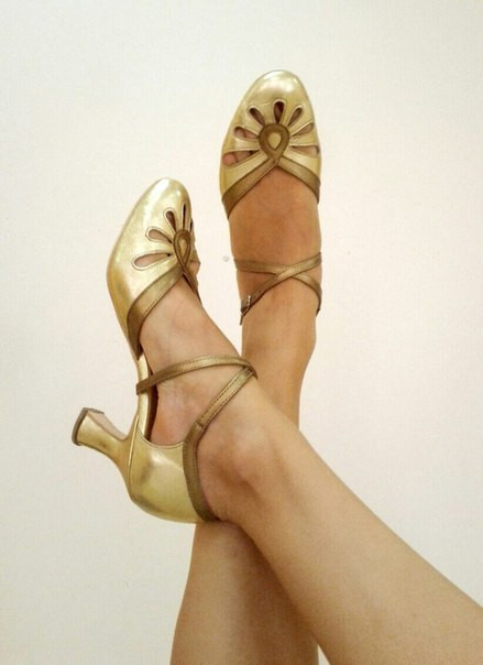 Beige dance shoes designed for swing dancing to elongate legs