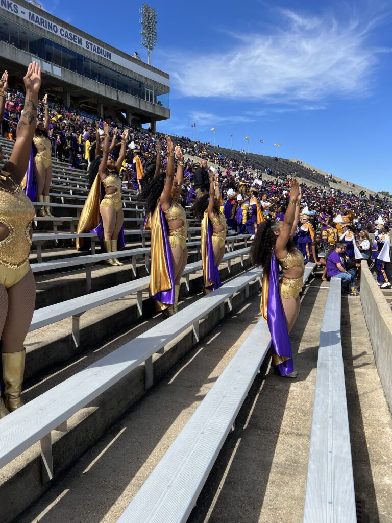 The Alcorn State University Golden Girls showcase a vibrant stand routine, a signature of majorette dance culture.