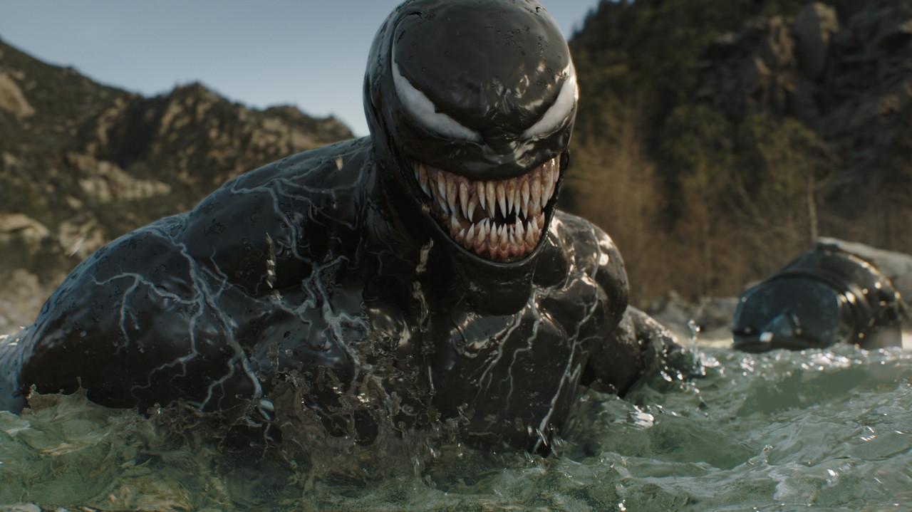 Venom The Last Dance Movie Still featuring Tom Hardy as Eddie Brock and Venom symbiote