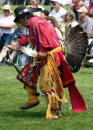 Native American Rain Dance - Woman in black dress and colorful shawls