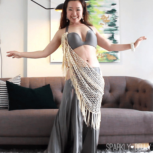 Hip scarf tied to a shoulder strap and draped over the torso