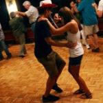 Woman in cowboy boots line dancing