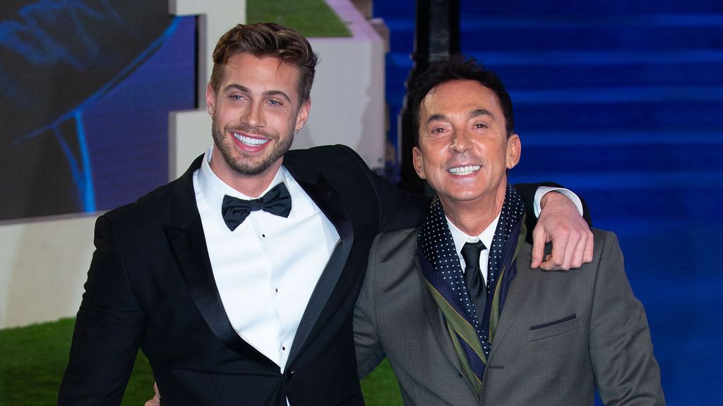 Bruno Tonioli and Jason Schanne at a film premiere, showcasing their long-term relationship with private moments.