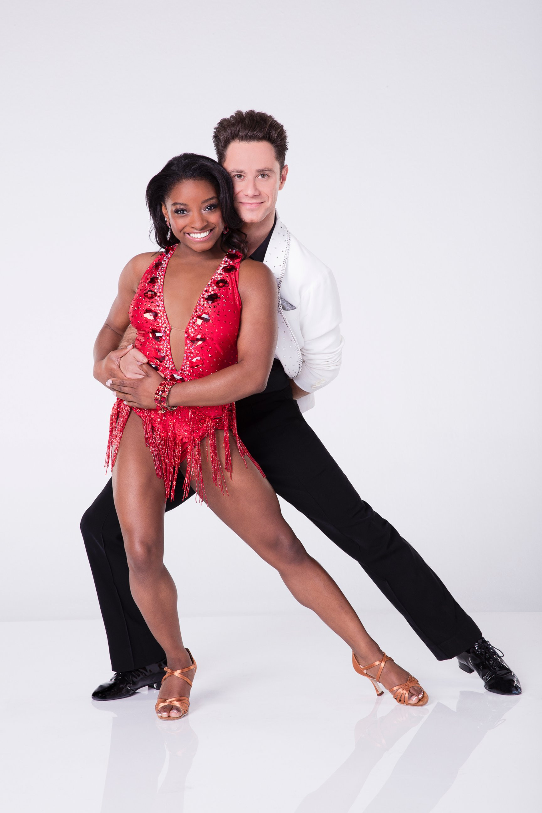 Simone Biles with Sasha Farber on Dancing With the Stars, showcasing their athleticism and precision