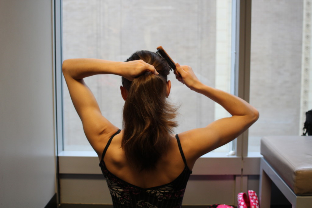 Smoothing hair for an elegant french twist