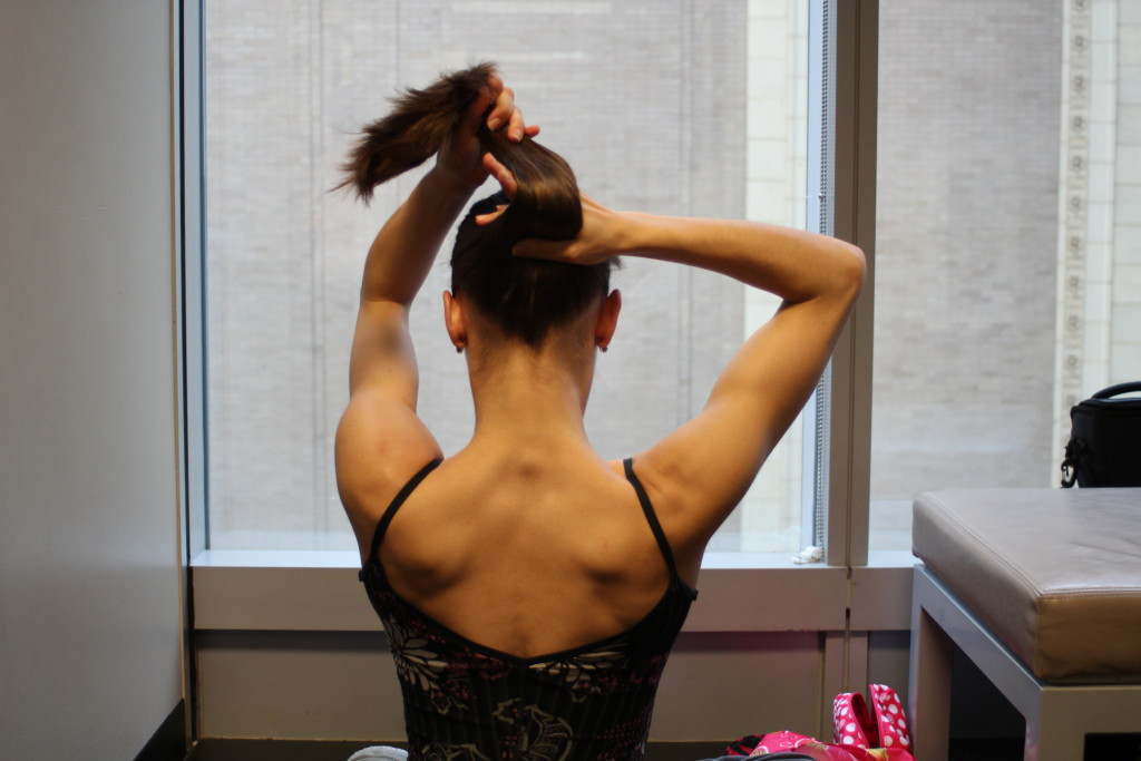 Twisting hair to form a french twist
