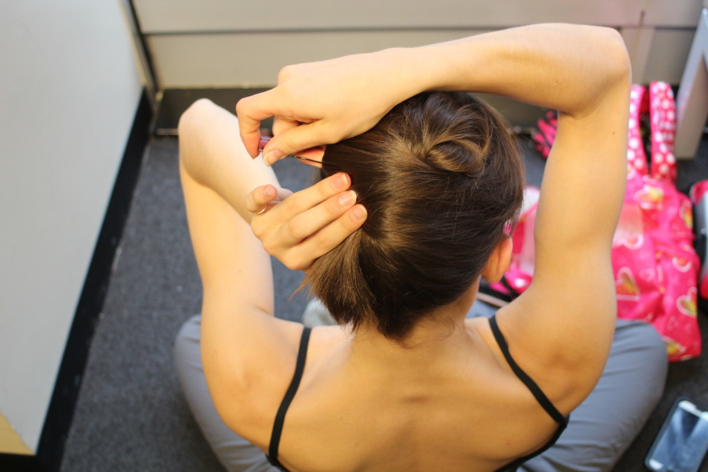 Tucking hair sides to the twist