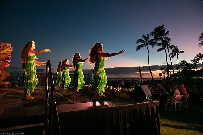 Sunset Silhouette of a Hula Dancer Evoking the Mystical Origins of the Dance in Hawaiian Culture