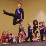 An Irish step dancer doing a leap
