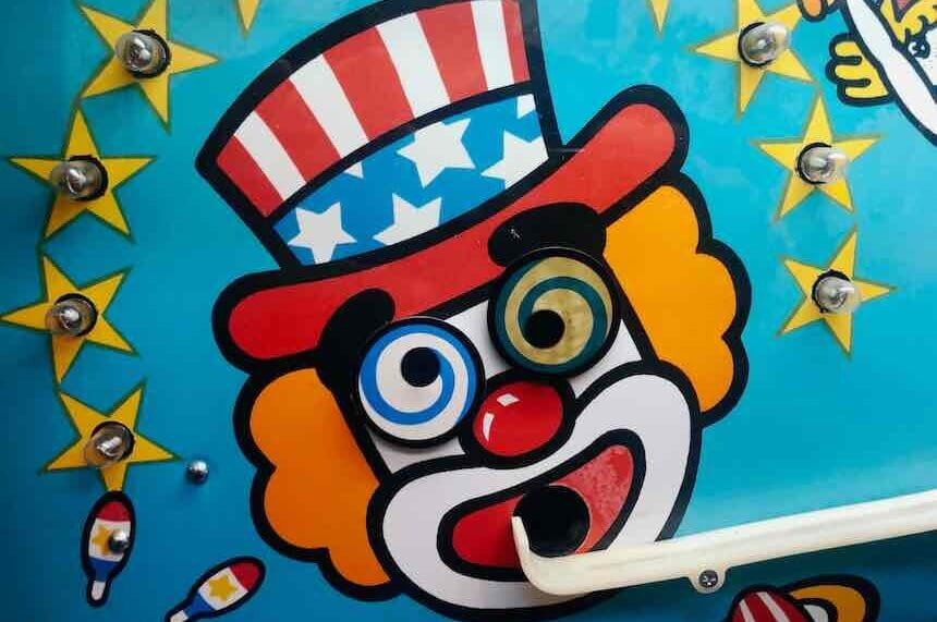 Tommy the Clown performing at an event, showcasing his unique style of dance and entertainment