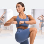 Woman doing Zumba steps during dance fitness class