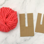 Crafting pom poms for the flamingo body